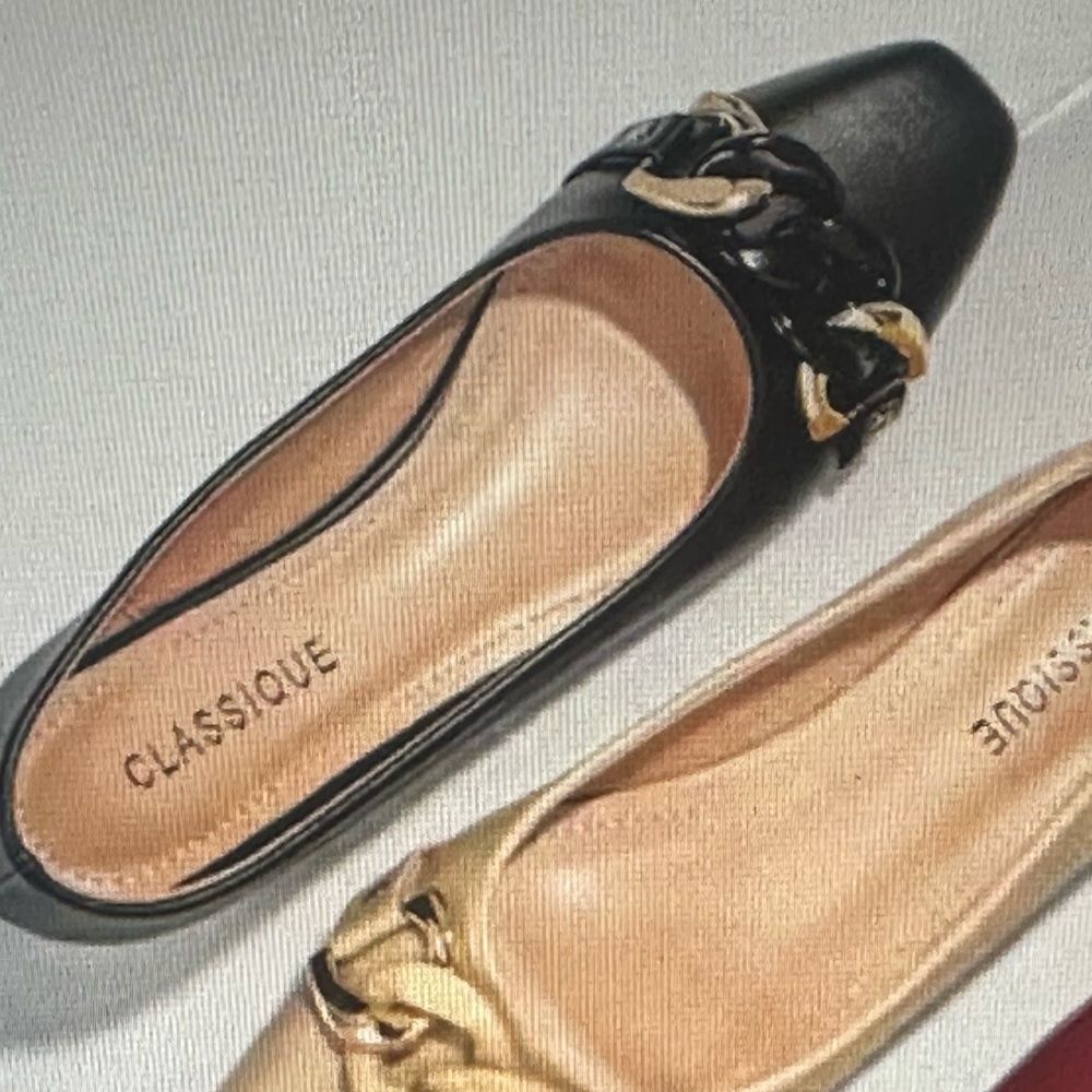 Black flat with gold buckle